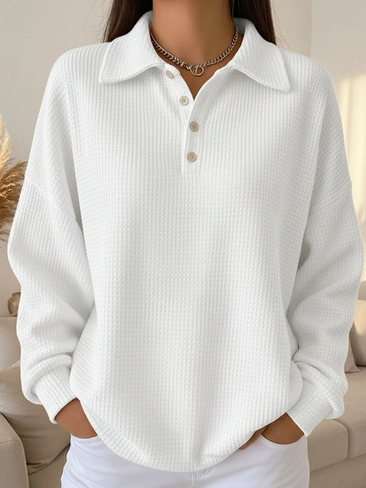 Cozy women's oversized collared Henley sweater, a smart casual long sleeve top for autumn fashion.