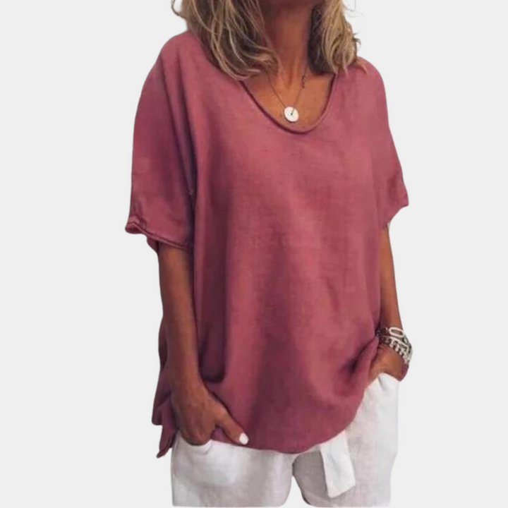 Close-up of the soft, breathable fabric of an oversized women's cotton t-shirt, ideal for summer fashion