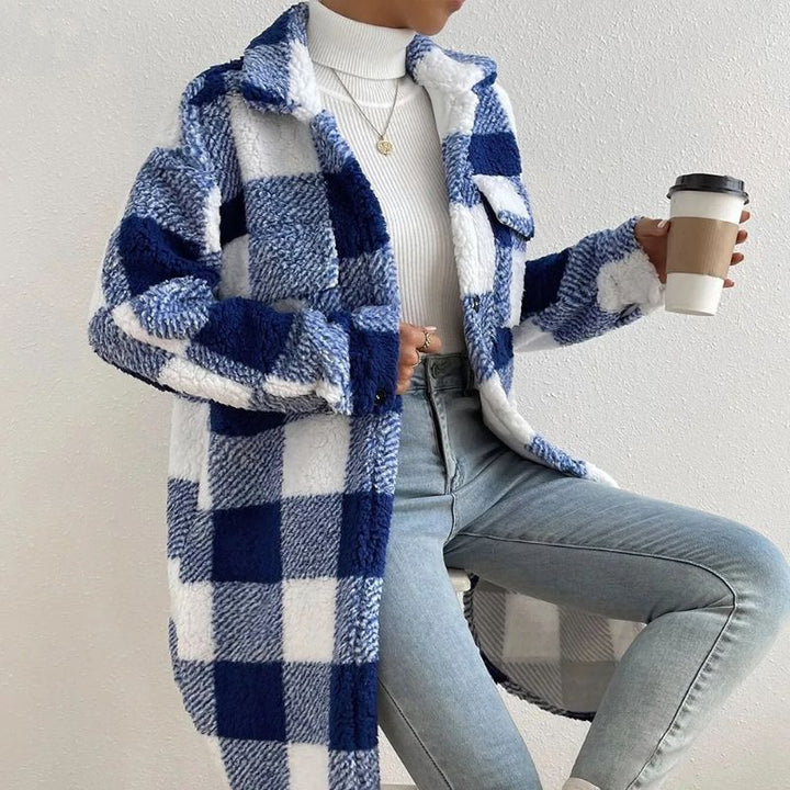 Cozy women's plaid shacket, oversized fit button-up jacket for relaxed fall outerwear.