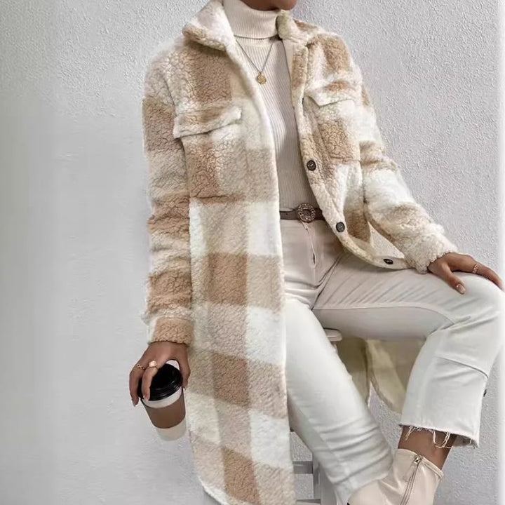 Relaxed fit women's plaid shacket, a warm oversized button-up top for fall fashion.