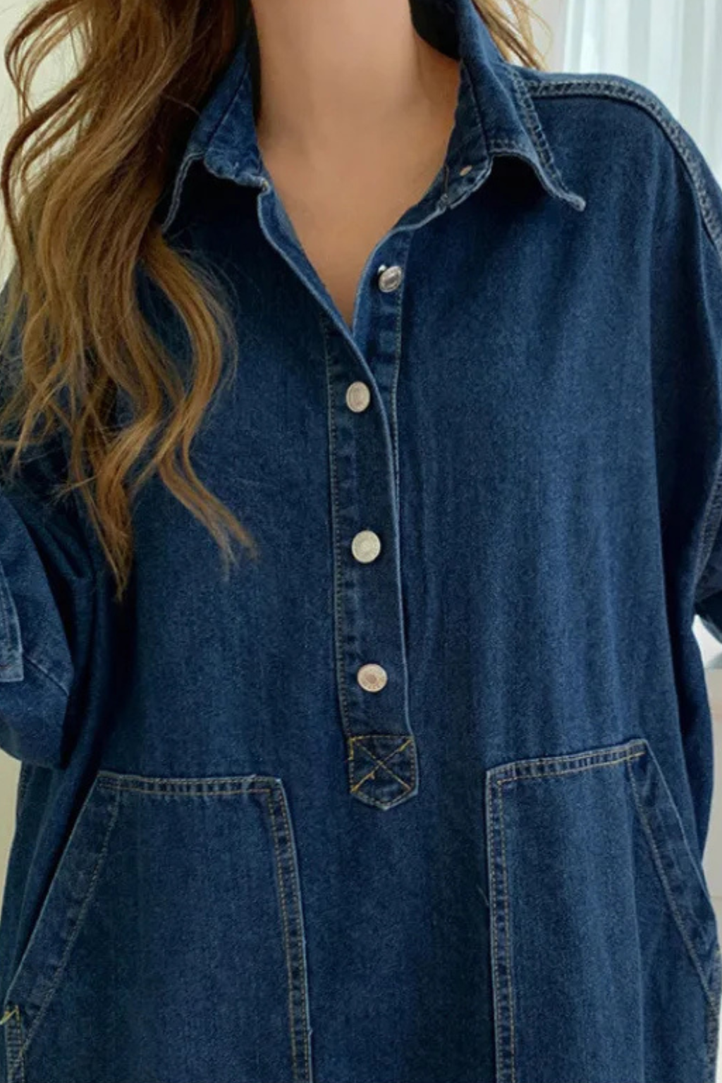 Stylish women's button-front denim maxi dress, oversized fit with pockets, perfect for spring/fall.