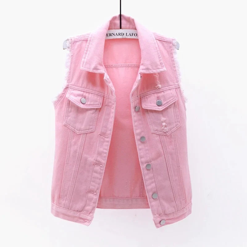 Women's oversized distressed denim vest, perfect for edgy street style layering.