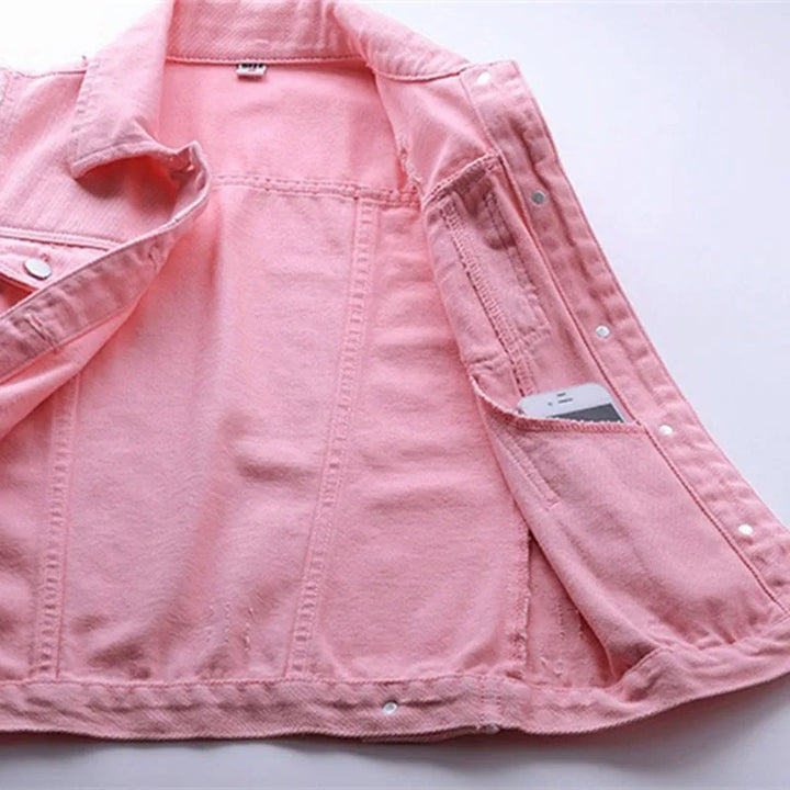 Casual women's sleeveless denim vest with trendy distressed details.