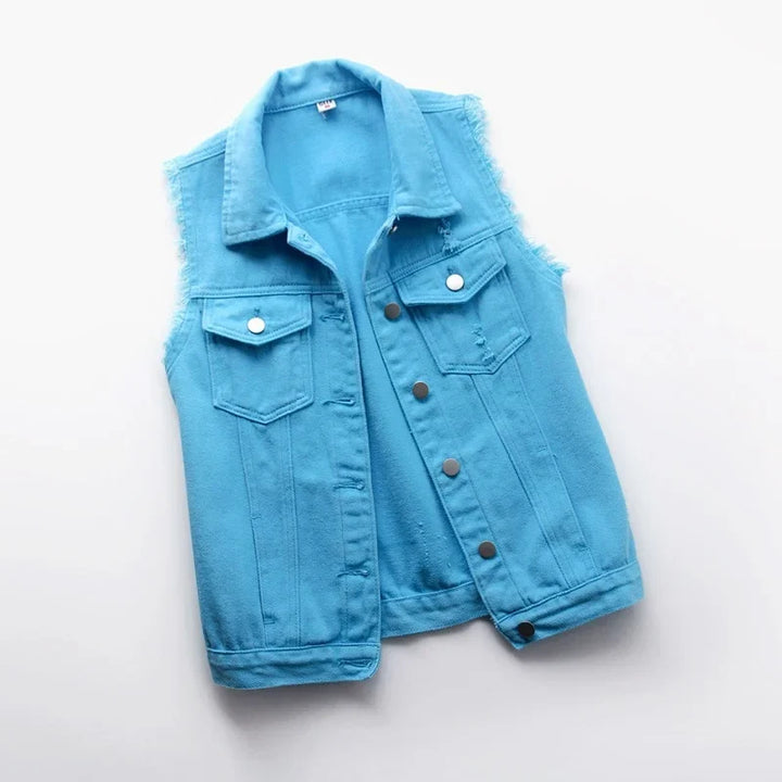Versatile women's distressed denim vest, ideal for layering and casual outfits.
