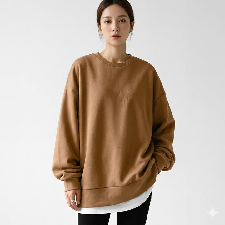 Women's oversized dropped shoulder sweatshirt in soft fabric, perfect for casual comfort & loungewear.
