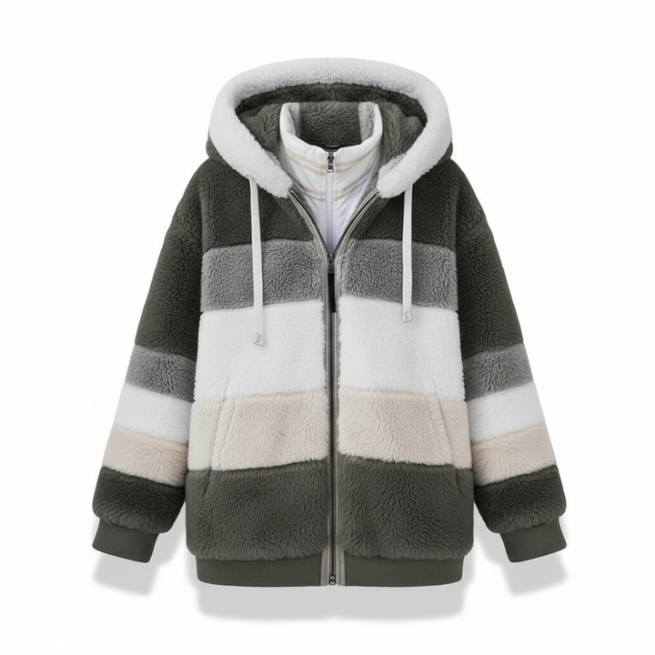 Women's oversized fleece vest, folded neatly to showcase its soft material and design