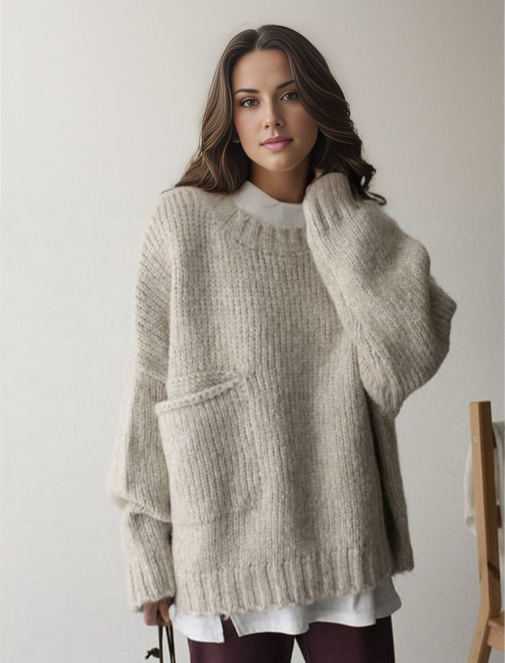 Women's oversized knit sweater in a cozy autumn shade for comfortable, casual style.