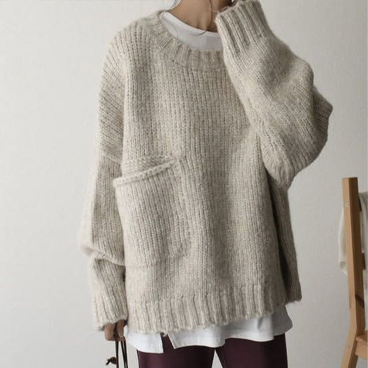Elegant oversized knit sweater for women, offering supreme autumn comfort & a chic, relaxed fit.