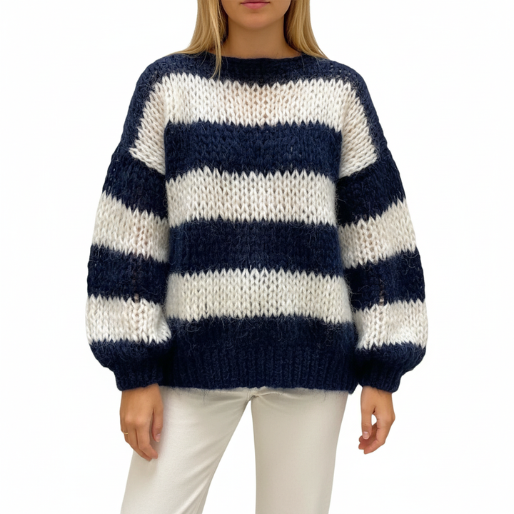 Women's long sleeve oversized knit sweater with a unique striped pattern, ideal for casual wear.