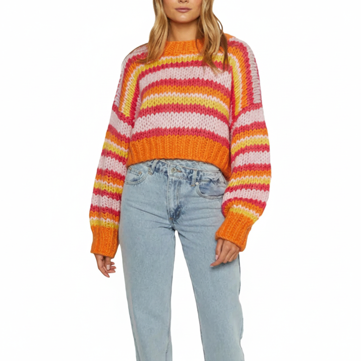 Cozy women's striped oversized knit sweater, designed for warmth and comfortable everyday wear.