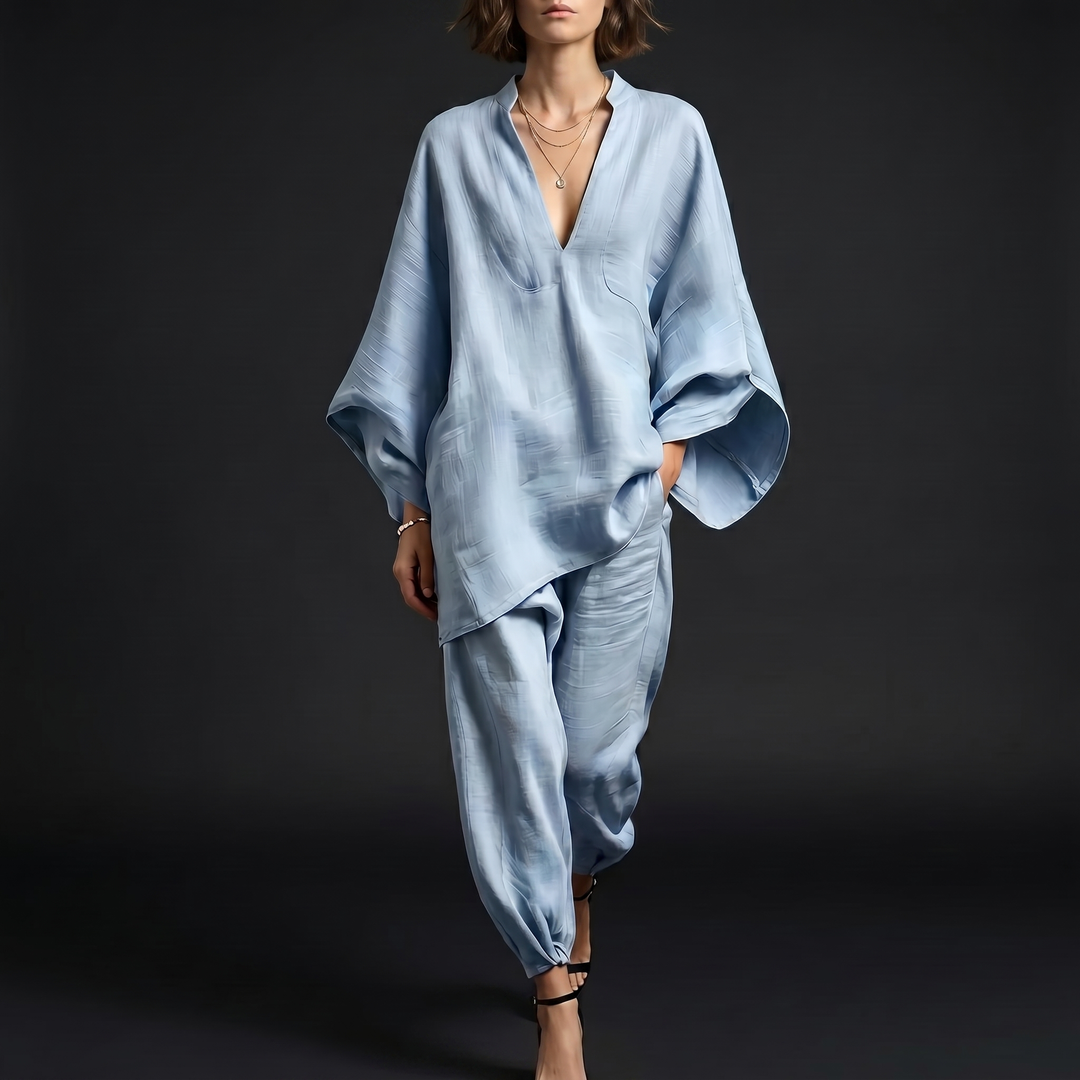 Women's oversized linen blend tunic top, casual and elegant for resort wear.