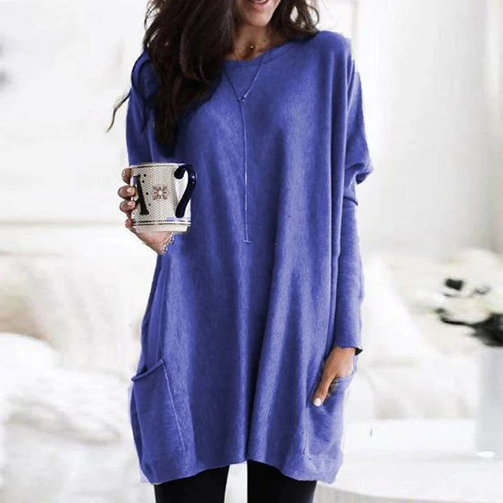 Women's casual oversized long sleeve tunic with deep pockets, perfect for a comfortable everyday look.
