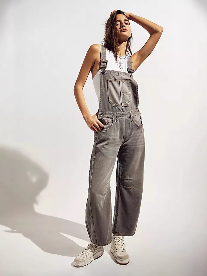 Women's oversized dungarees with multiple utility pockets, perfect for casual comfort & streetwear style.