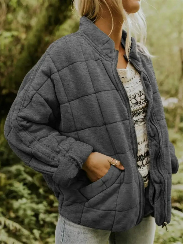 Women's oversized padded jacket, perfect for transitional fall fashion.