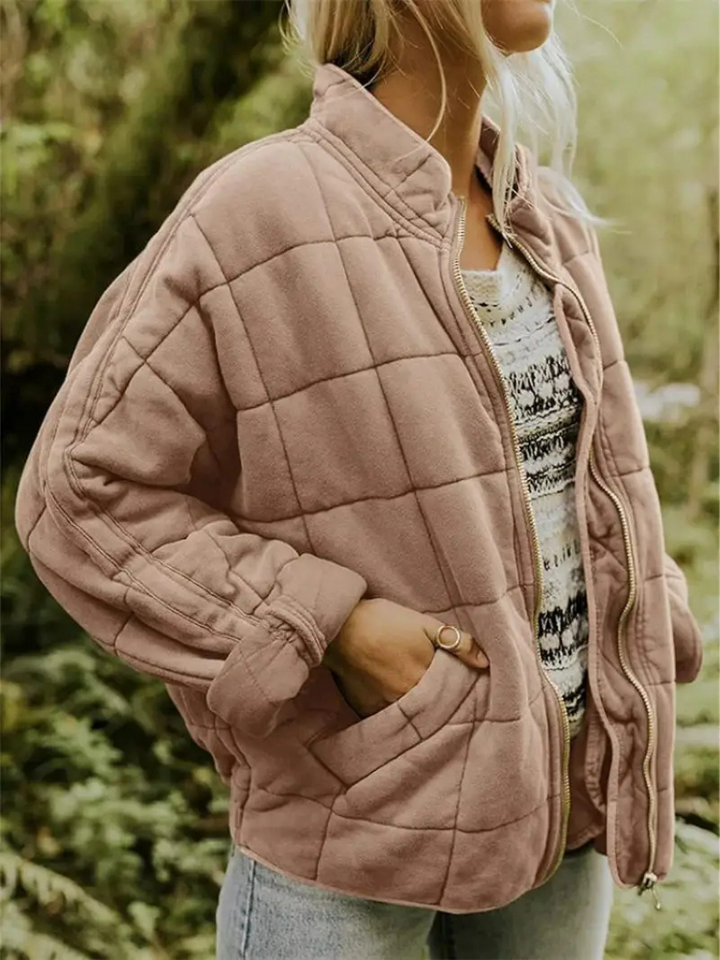Women's oversized padded jacket, an essential for transitional spring style.