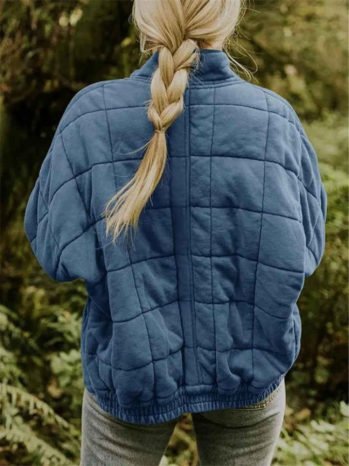 Transitional women's padded jacket, oversized and warm for spring style.