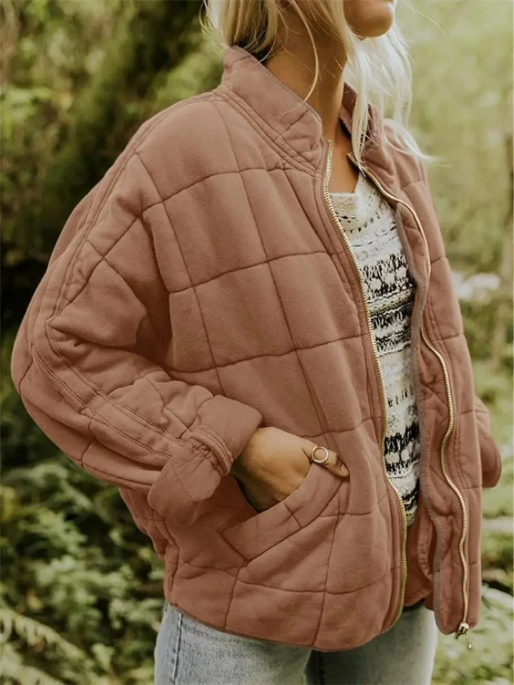 Stylish women's oversized padded intermediate jacket, fall fashion essential.