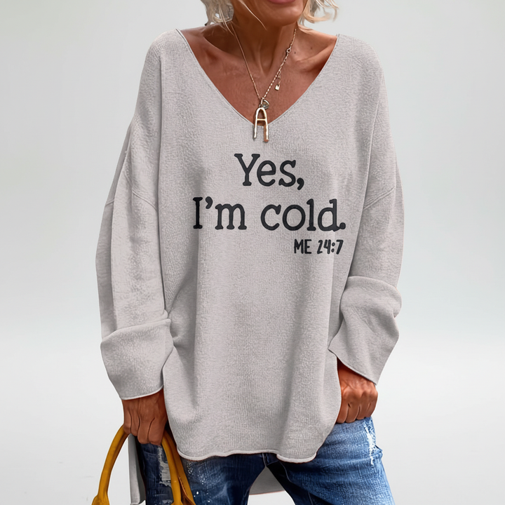 Stylish women's V-neck sweater, oversized knitwear with an eye-catching pattern