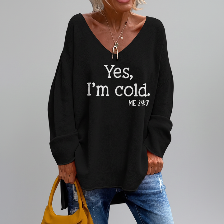 Fashionable women's oversized V-neck sweater with unique pattern, ideal for autumn/winter