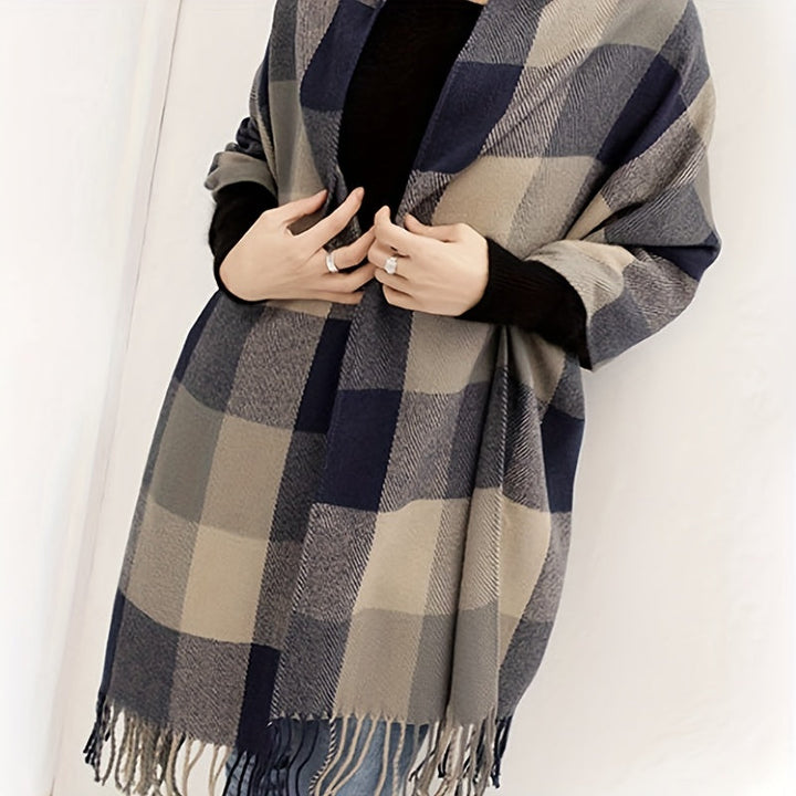 Cozy women's oversized blanket scarf in a fashionable plaid design, ideal for winter warmth & stylish comfort.