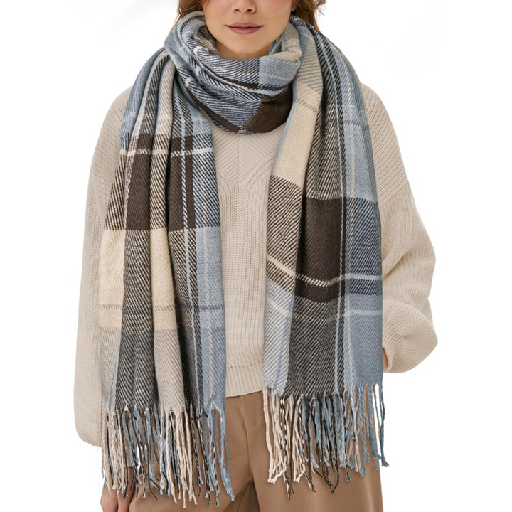 Stylish women's oversized winter scarf featuring a classic plaid pattern, full view.