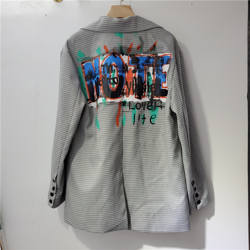 Chic women's oversized printed blazer; a versatile statement jacket with pocket for casual or workwear.