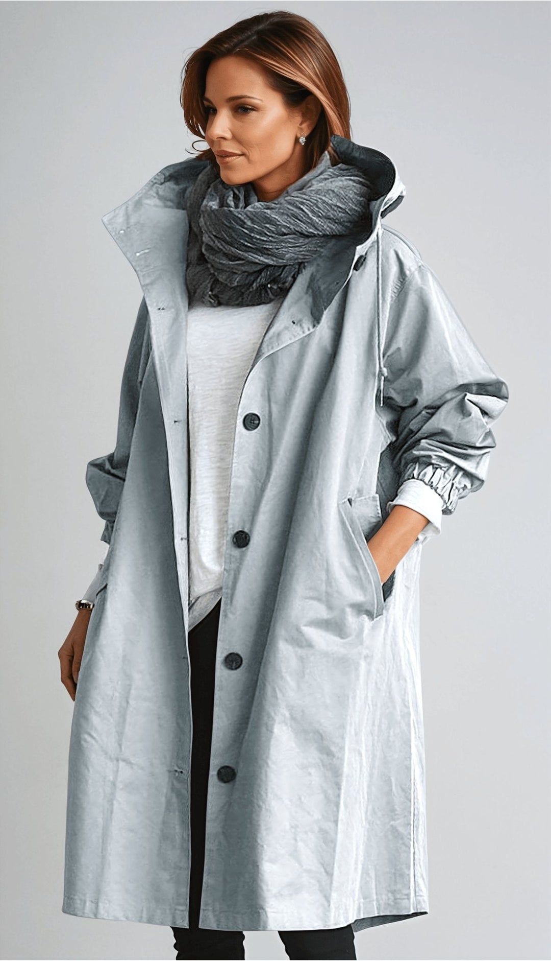 Women's oversized rain parka trench coat. Water-resistant outerwear, ideal for all seasons & layering.