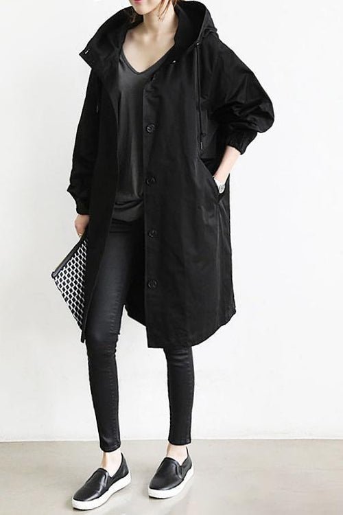 Chic women's oversized trench coat. Water-resistant outerwear, perfect for spring, fall, and transitional weather.