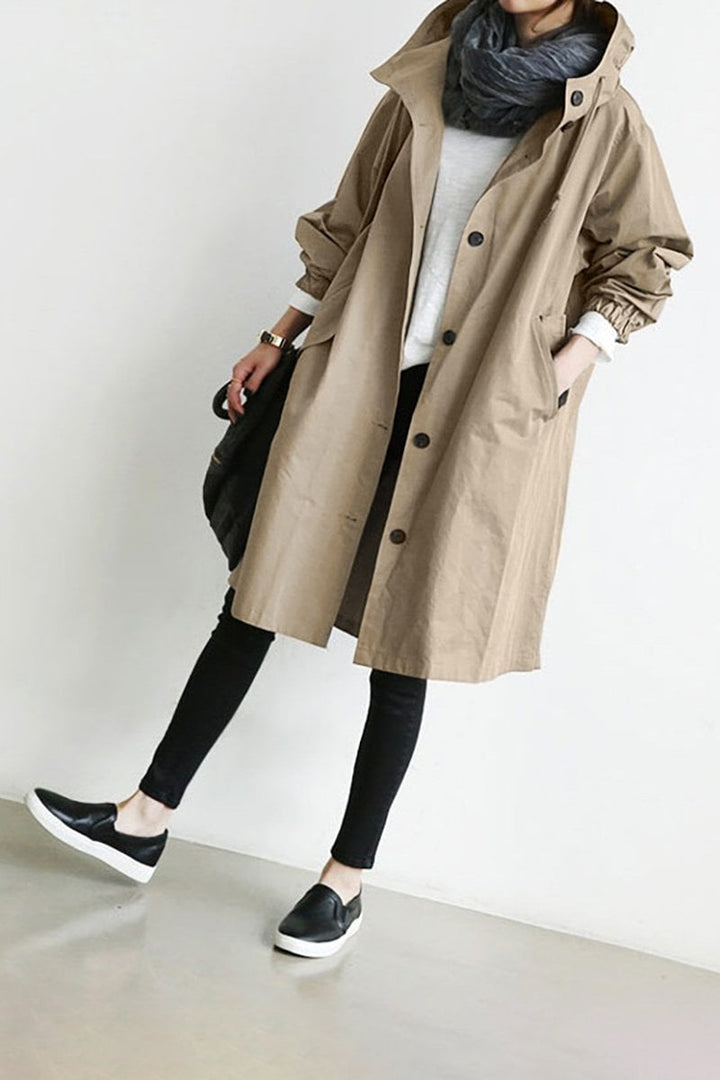 Spring & fall oversized women's rain parka. Water-resistant trench coat, essential for transitional weather.