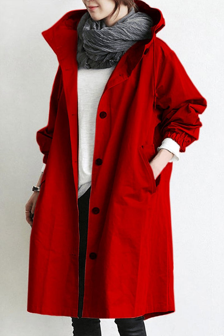 Stylish oversized women's trench coat. Water-resistant outerwear for all seasons, perfect for casual chic fashion.