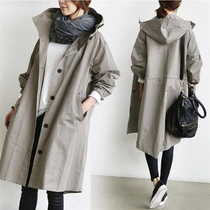Oversized women's rain parka trench coat. Water-resistant, stylish outerwear, excellent for spring & fall fashion.