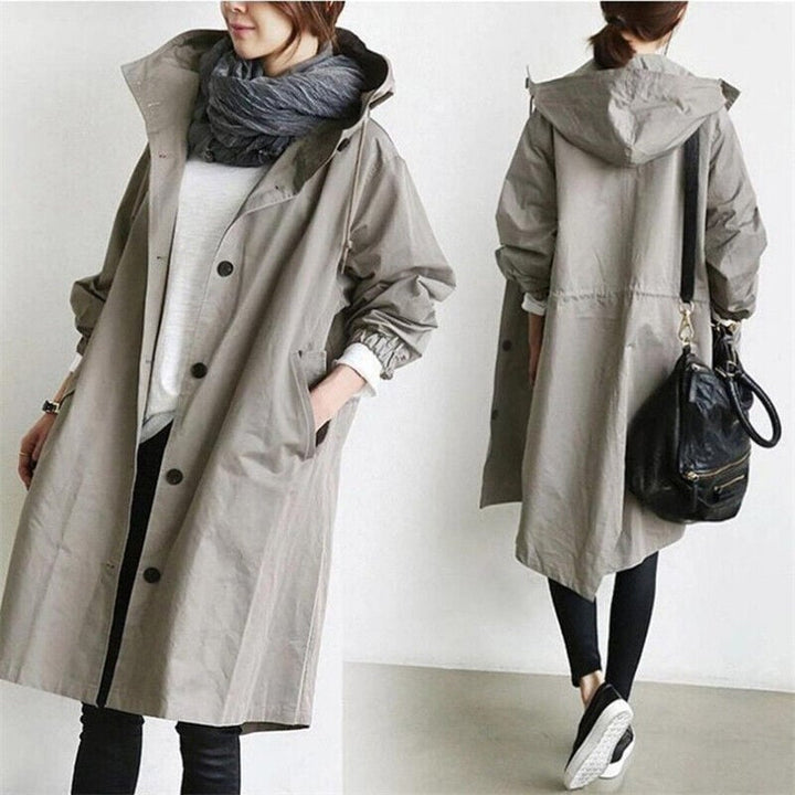 Oversized women's rain parka trench coat. Water-resistant, stylish outerwear, excellent for spring & fall fashion.