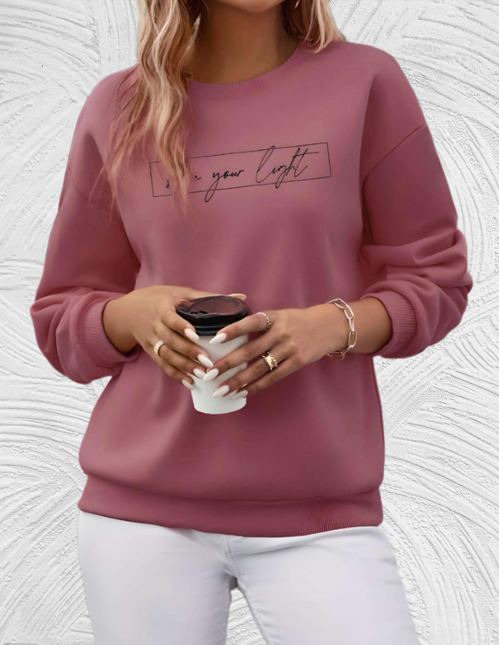 Women's cozy oversized round neck sweater, a chic & comfortable fall fashion piece for daily wear.