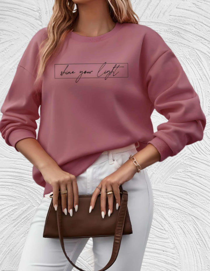Versatile women's oversized round neck sweater, perfect for layering and casual elegance in fall.