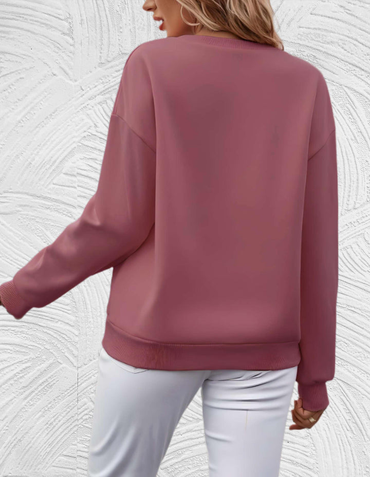 Modern oversized women's sweater, round neck knit for a relaxed yet chic winter style statement.