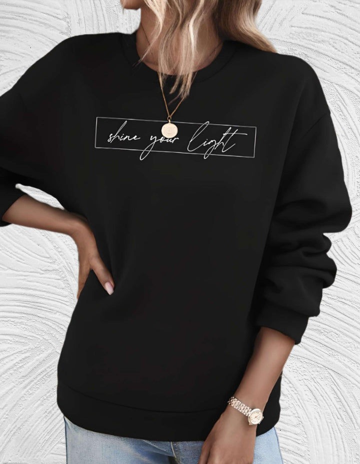 Relaxed fit women's oversized round neck sweater, designed for cozy warmth and casual chic style.