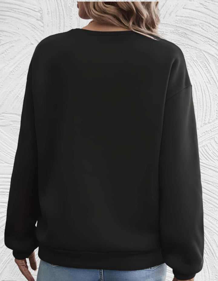 Elegant oversized women's round neck sweater, a comfy knit for chic fall and winter fashion looks.