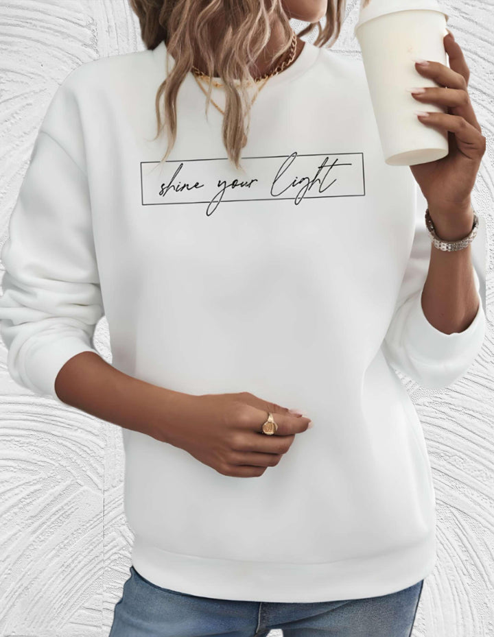 Cozy women's oversized round neck sweater, a comfortable top perfect for fall and winter fashion.
