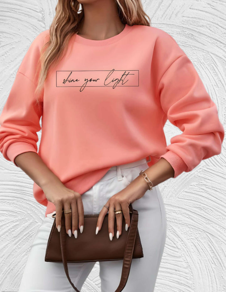 Comfortable oversized women's round neck sweater, a stylish essential for casual chic apparel.
