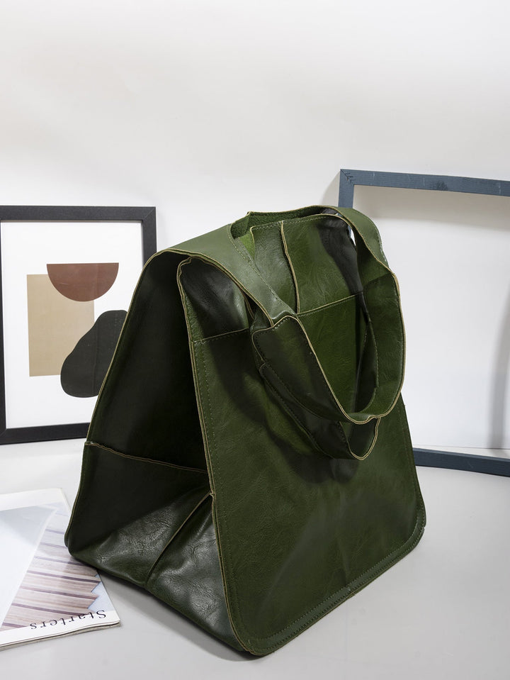 Modern women's oversized shoulder bag, a practical fashion accessory with spacious interior.