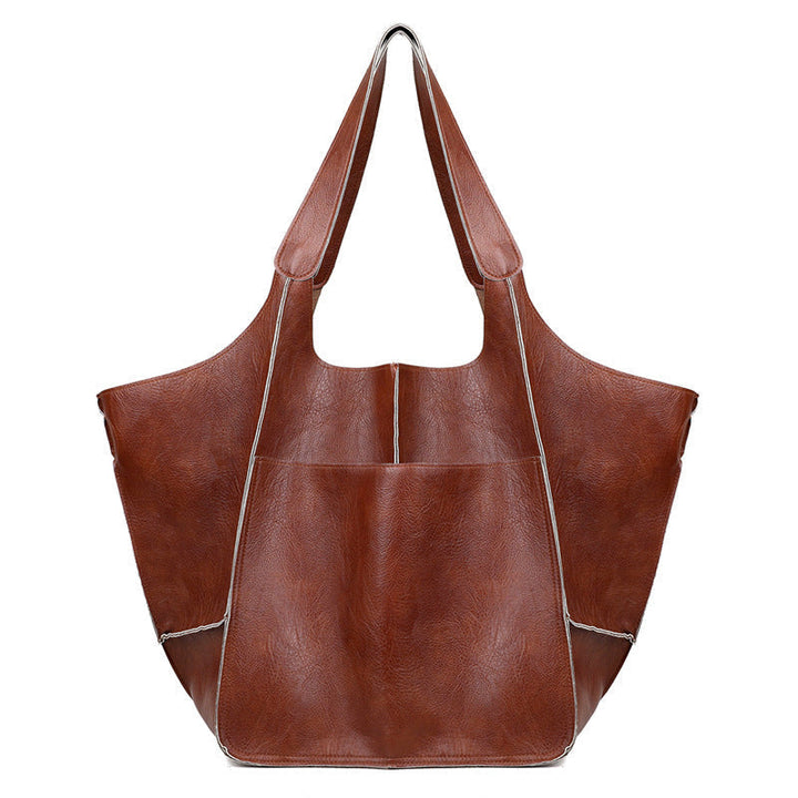 Women's oversized travel weekend bag, stylish and spacious carryall.