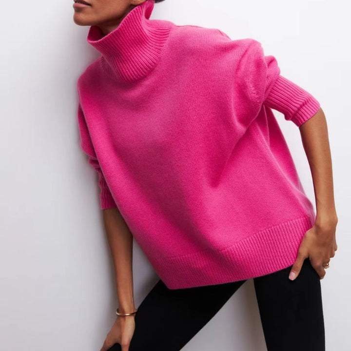 Women's oversized turtleneck sweater, cozy & warm for fall/winter comfort.
