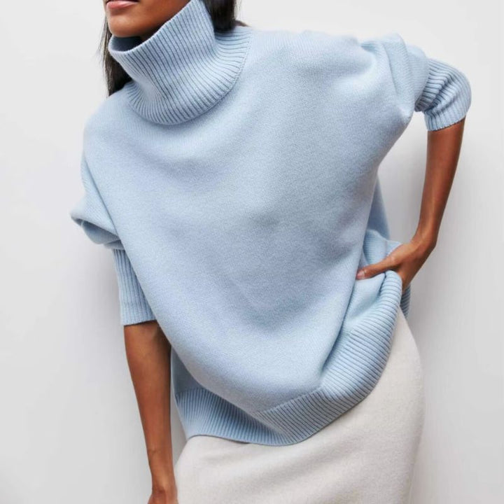 Stylish women's long sleeve turtleneck sweater, perfect for casual layering in winter.