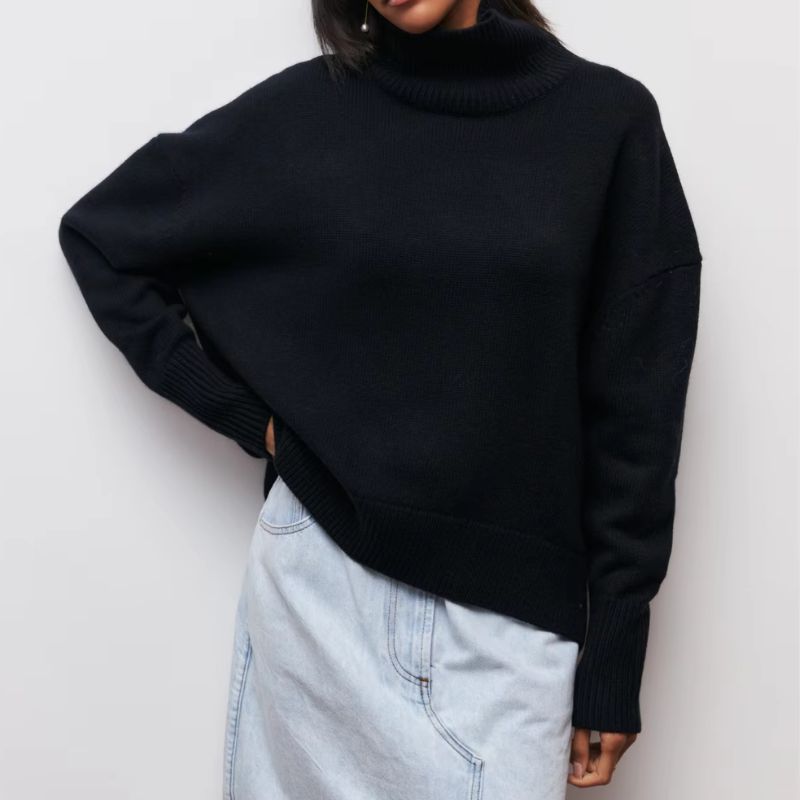 Soft knit women's oversized turtleneck, perfect for cozy, relaxed fit comfort in fall.