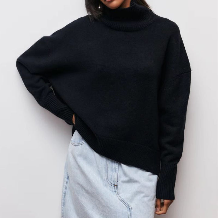 Soft knit women's oversized turtleneck, perfect for cozy, relaxed fit comfort in fall.