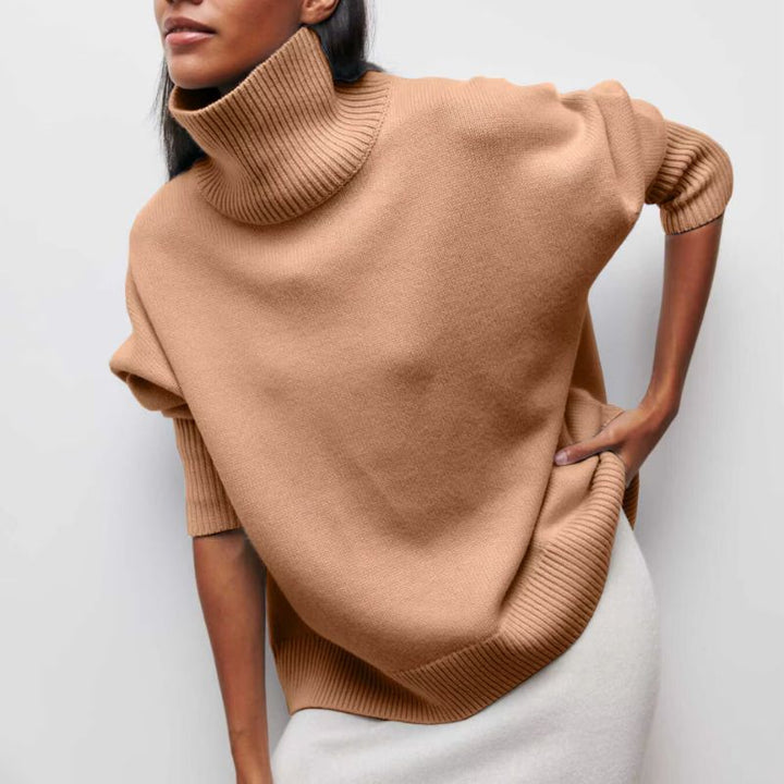 Women's oversized turtleneck sweater, offering cozy warmth & relaxed comfort for fall.