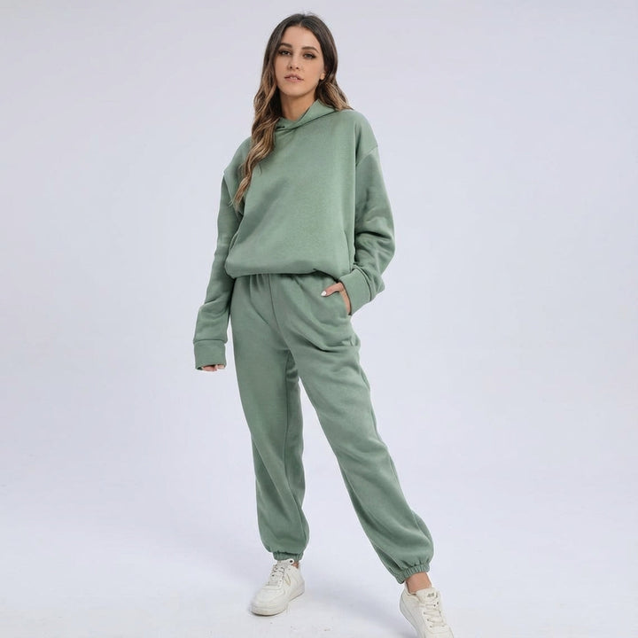 Stylish women's oversized tracksuit, white two-piece set, comfortwear for casual outfit