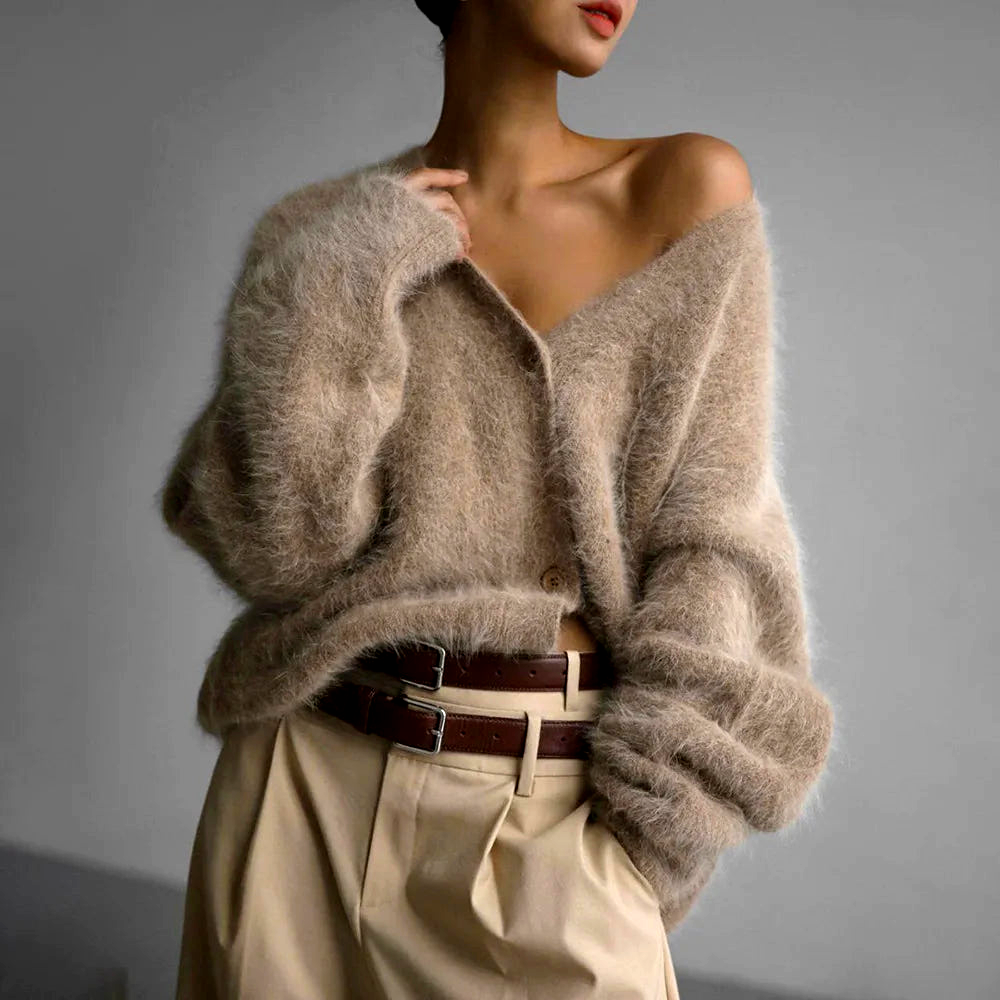 Relaxed fit women's long sleeve V-neck cardigan, perfect for casual and comfortable fashion.
