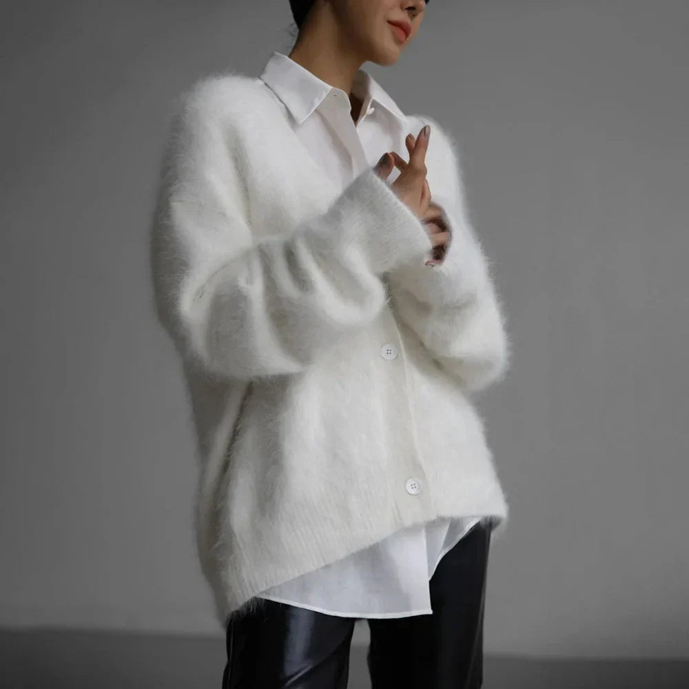 Stylish women's oversized V-neck cardigan, a cozy and versatile layering piece for any outfit.