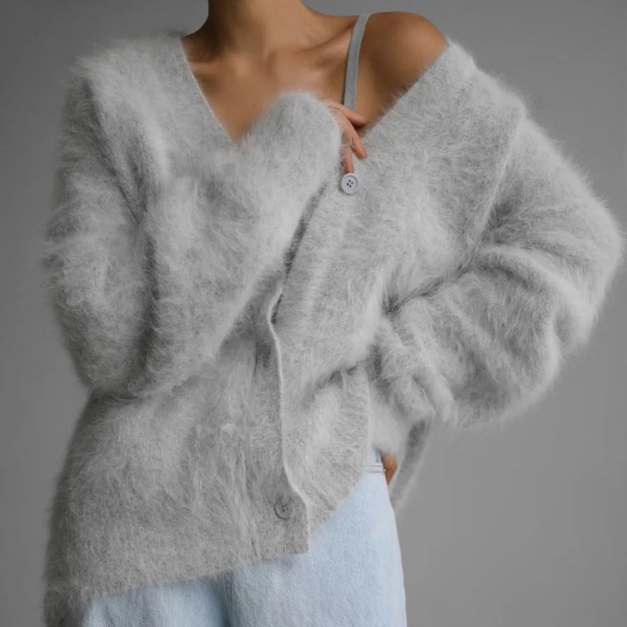 Trendy women's oversized V-neck button-front cardigan, perfect for a cozy and fashionable look.